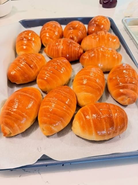 A tray of freshly baked salted bread